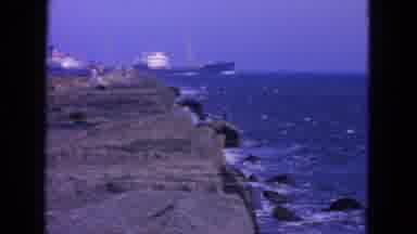 San Francisco California (1963): Small Waves Crash Into Rocks At A Seaside