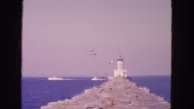 San Francisco California (1963): Seagulls Flying Around A Lighthouse At The Beach