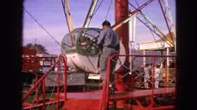Walworth Wisconsin USA (1963): A Ride Attendant Loads Passengers Into A Variant Of