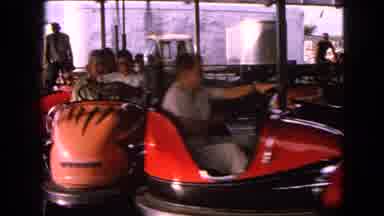 Walworth Wisconsin USA (1963): Groups Of People Having Fun Driving In Bumper Cars