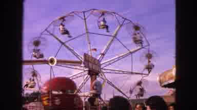 Walworth Wisconsin USA (1963): People Having Fun At A Fairground With Ferris Wheel