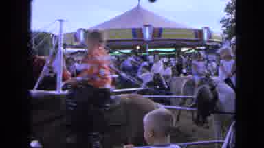 Walworth Wisconsin USA (1963): A Shot Of A Classic Merry-Go-Round With Children