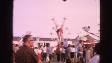 Walworth Wisconsin USA (1963): There Is A Man In A Dressing Shirt Watching People