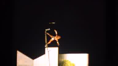 Walworth Wisconsin USA (1963): A Person Is Performing Acrobatics On A Pole Near To
