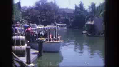 Disneyland California (1962): Many People Floating On A Boat Down A Scenic River