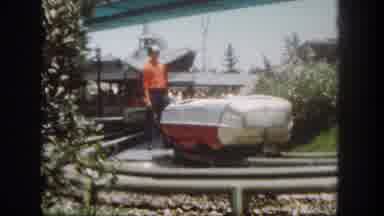 Disneyland California (1962): Amusement Park Ride With Attendant And A Group Of
