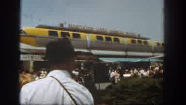 Disneyland California (1962): People Walking Amusement Park Yellow Guy On A Hat