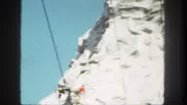 Disneyland California (1962): Man Climbs Cliff Face While Others Ride Cable Cars