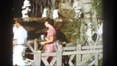 Disneyland California (1962): People Walking Across A Bridge In Front Of A