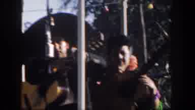 Disneyland California (1962): A Group Of Women And Men Playing Instruments Under A