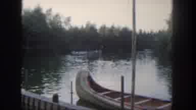 Disneyland California (1962): A Canoe Sits At A River Dock On A Peaceful Day