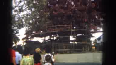Disneyland California (1962): A Large Family Walking On A Path With A Wooden