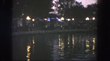 Disneyland California (1962): Water Lake Lights Trees Night Calm Serene Peaceful