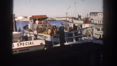 San Diego California (1962): People Pile Onto The Ship By Walking Down The Ramp To