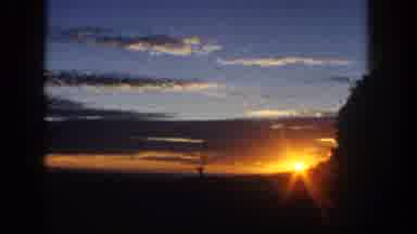 San Diego California (1962): Sunset Over A Mountain Top With Blue Skies And Tree