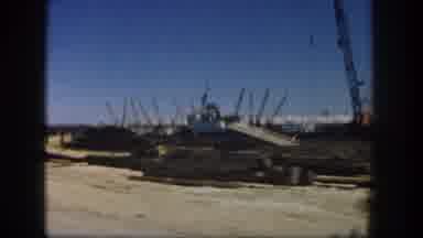 San Diego California (1962): Video Of A Construction Site With A Crane And Other