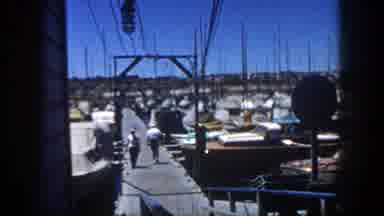 San Diego California (1962): Man Walking Down A Ramp In A Pier Surround By By