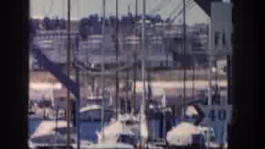 San Diego California (1962): Slow Panning Video Footage Of A Boat Dock With Signs