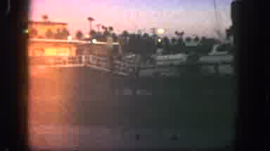 San Diego California (1962): White Yacht Docked By Pier And A White House At Dusk