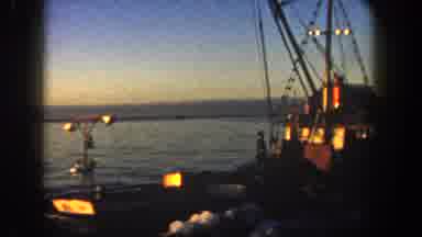 San Diego California (1962): A Small Boat Hauling A Smaller Fishing Boat Behind It