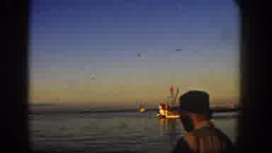 San Diego California (1962): Man Wearing Hat Stands On The Dock And Waters The