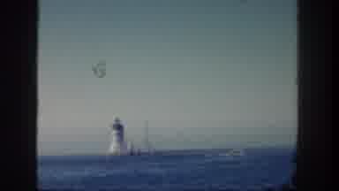 San Diego California (1962): Boat Moving Across The Ocean With Lighthouse In The