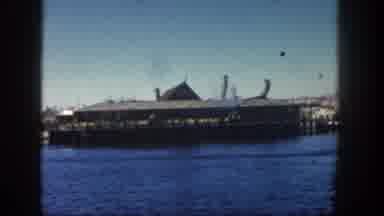 San Diego California (1962): A Large Building On The Water Set On A Pier Made Of