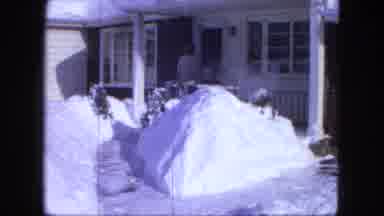 Proctor Minnesota (1963): Person In Front Of The House A Pile With A Lot Of Snow