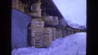 Proctor Minnesota (1963): Moving Shot Of Lumberyard In The Winter After A Very