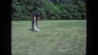 Saint Paul Minnesota (1963): A Dog Play With Their Owner In Garden