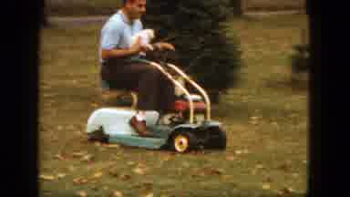 Saint Paul Minnesota (1963): A Man Holding A Small Puppy Riding On A Older Riding