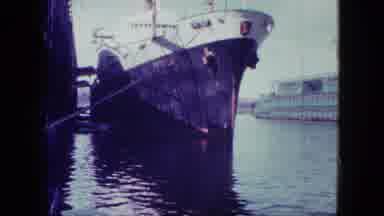 San Diego California (1963): A Group Of People Are Talking And There's A Yacht