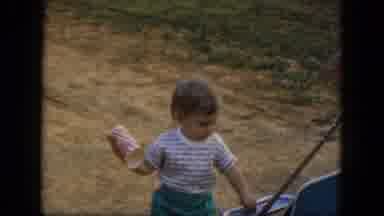 Albany New York (1964): Little Boy Plays With Can Of Soda And Is Placed In Buggy