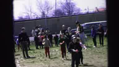 Camden New Jersey (1964): Many Children In A Field Walking Backwards While Trying