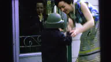 Camden New Jersey (1964): A Boy In A Heavy Helmet Showing Off An Egg And His