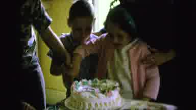 Camden New Jersey (1964): Little Boy Helping Little Girl Cut Birthday Cake At