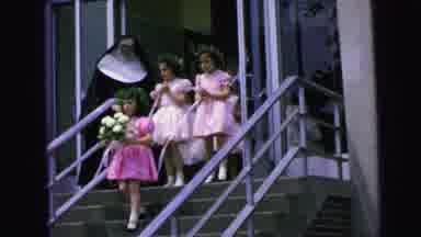 Camden New Jersey (1964): A Girl Holds Flowers Followed By Girls Holding Their