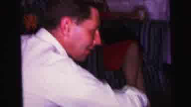 Camden New Jersey (1964): Middle Aged Man And Older Woman Sitting On Couches