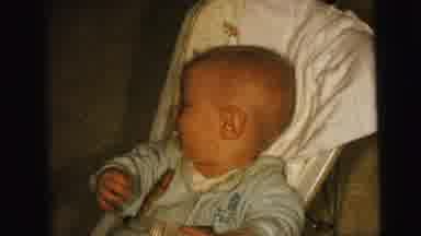 Camden New Jersey (1964): Baby Boy Dressed In Blue Sits In Bouncing Chair