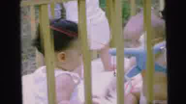 Camden New Jersey (1964): The Baby's Are Playing On The Baby Swing
