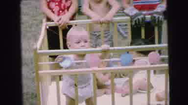 Camden New Jersey (1964): A Little Boy Is Playing With A Little Toy Inside The