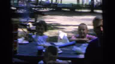 Camden New Jersey (1964): Children Sit At Picnic Tables While Adults Prepare Food