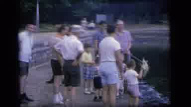 Camden New Jersey (1964): A Group Of People Gathered By The Water And A Group Of