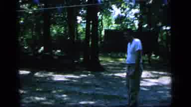 Camden New Jersey (1964): Kids Playing With Father In The Garden Or Forest Area