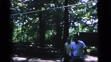 Camden New Jersey (1964): Three Adults Playing Badminton In A Forest Together Two