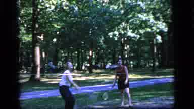Camden New Jersey (1964): People Play Badminton Together In The Shade In The Park