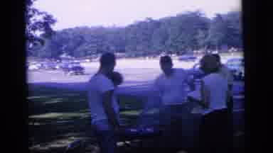 Camden New Jersey (1964): Small Group Of Adults In Summer Wear Gather Around