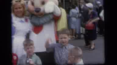 Camden New Jersey (1964): Woman And Dressed Up Character Waving At A Camera With
