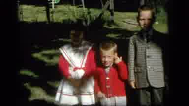 Camden New Jersey (1964): Three Children Standing Next To Each Other On A Sunny
