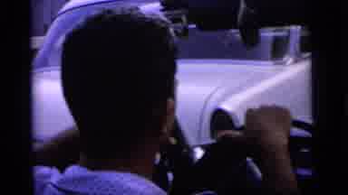 Camden New Jersey (1964): A View Of People Sitting In Cars Possibly Traffic